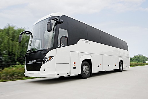 White bus on the road, model: scania touring